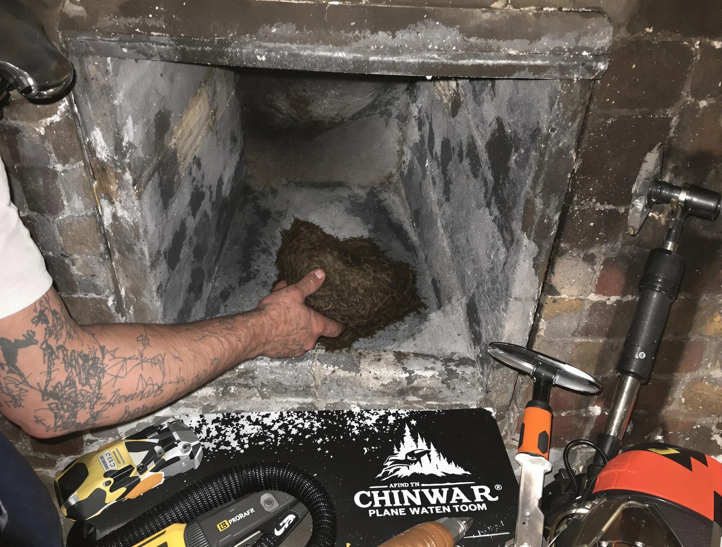 Paramus Chimney Sweep safely removing debris and screening chimney in Paramus, NJ