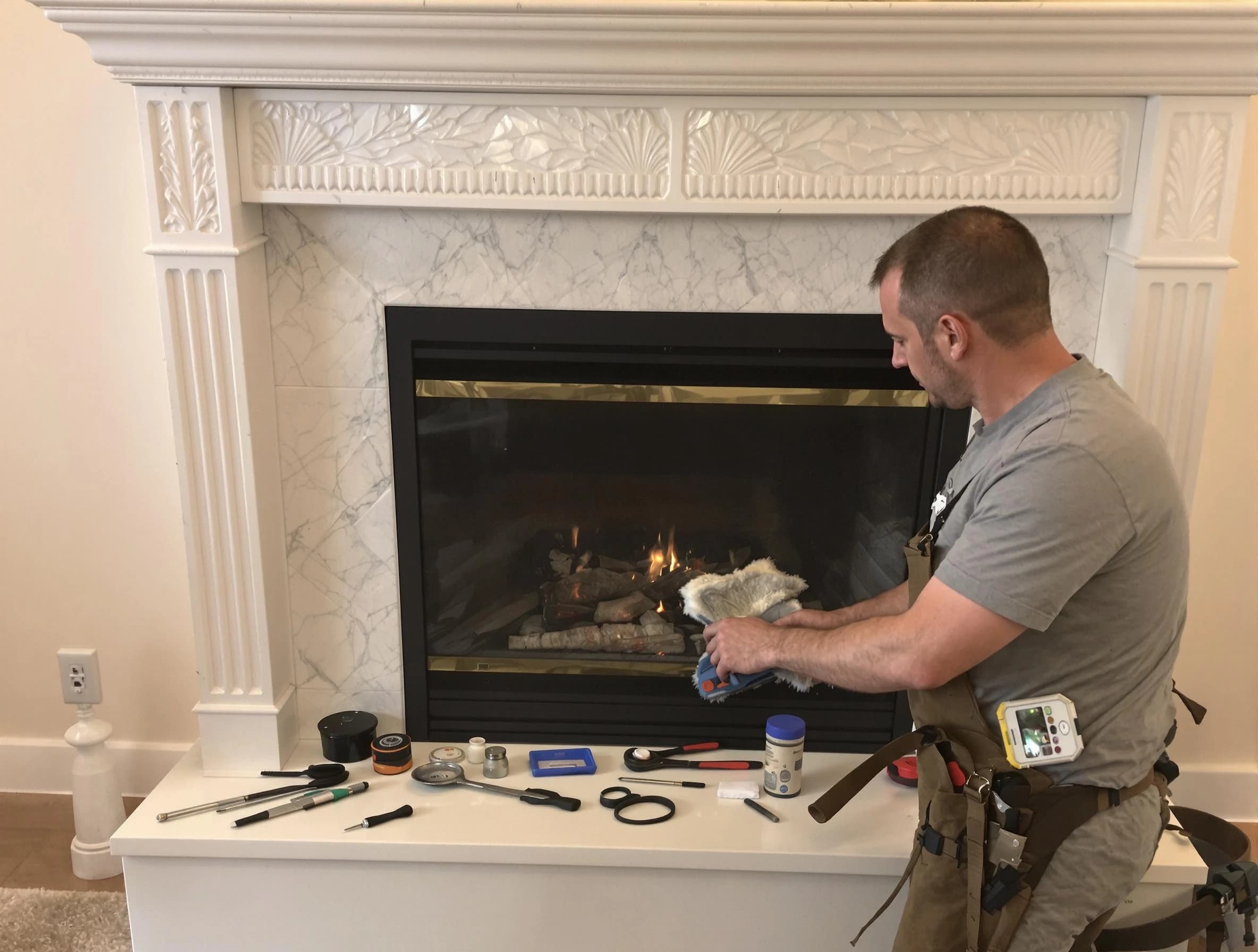 Paramus Chimney Sweep performing fireplace maintenance in Paramus, NJ